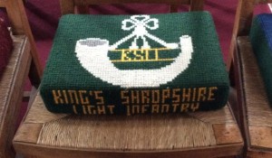 This kneeler was worked to honour the memory of soldiers in the KSLI